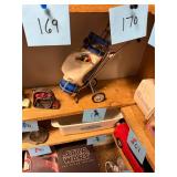 Vintage metal golf bag with miniature golf clubs