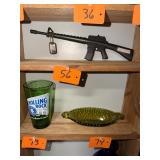 Vintage lighter / machine gun with dog tags