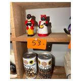 Pair of vintage black Americana S + P shakers