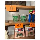 Pair of vintage Donald Duck orange juice cups