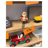 Vintage lead Santa on skis figure / complete