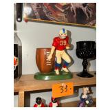 Vintage football player planter