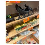 Vintage cast iron sleigh with brass bell