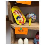 Pair of vintage metal tin noisemakers