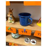 Vintage blue speckled enamel ware cup