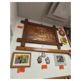 Hammered copper wood framed the last supper...