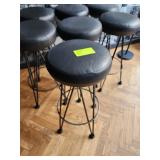 SEVEN BACKLESS STOOLS