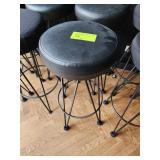 TWELVE BACKLESS STOOLS