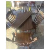 Drop leaf table with four chairs 42x42 with two