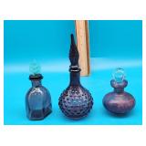 3 Purple decanters with Stoppers