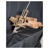 Antique mechanical tool with wood and metal