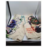 Ed Hardy swim trunks with graphic print