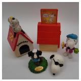 Snoopy figurines with Snoopy's doghouse