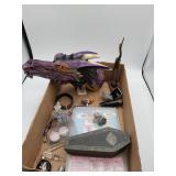 Box lot with dragon mask, carved bird, toys