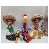Three marionette puppets with hats