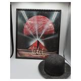 Framed space art print with gray bowler hat