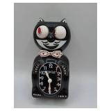 Kit-Cat Klock black wall clock with bowtie