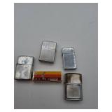 Five metal lighters with Buick lighter