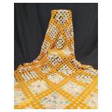 Yo-yo quilt with yellow and floral cotton