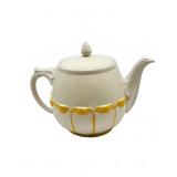 White and Yellow Ceramic Teapot