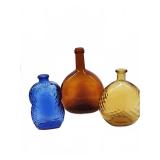 Three Colored Glass Bottles