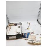 Loose Postage Stamps in Shoebox