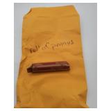 Roll of Pennies in Paper Wrapper