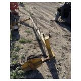 3 point attachment for unrolling 8' net wire.