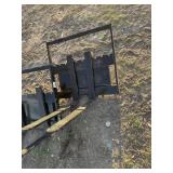 1 set of mini skid steer pallet forks.