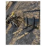 1 set of mini skid steer pallet forks.