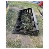 Wolverine SB72 skid steer rock bucket.