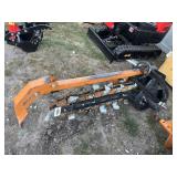 Land Honor MFT-72-38L mini skid steer trencher.