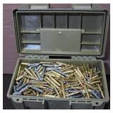 Assorted .223 Cartridges in Poly Ammo Container