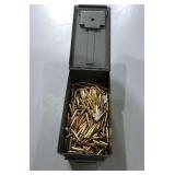 Assorted 5.56mm Cartridges in Metal Ammo Container