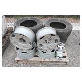 P265 / 65R18 tires w/ rims / hub caps / lug nuts