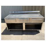 Winholt 72x30 stainless steel work table on caster