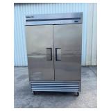True T-49F 2 door freezer on casters.