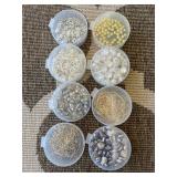 jewelry making supplies featuring various charms,