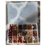 Assorted beads in various shapes, sizes and materi