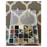 Assorted beads in various shapes, sizes and materi