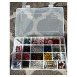 Assorted beads in various shapes, sizes and materi