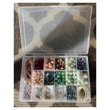Assorted beads in various shapes, sizes and materi
