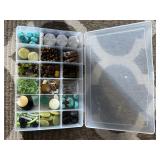 Assorted beads in various shapes, sizes and materi