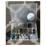 Assorted beads in various shapes, sizes and materi