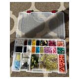 Assorted beads in various shapes, sizes and materi