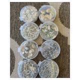 jewelry making supplies featuring various charms,