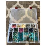 Assorted beads in various shapes, sizes and materi