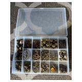 Assorted beads in various shapes, sizes and materi