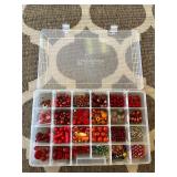 Assorted beads in various shapes, sizes and materi