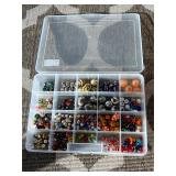 Assorted beads in various shapes, sizes and materi